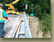 Lowering-the-mini-excavator-down