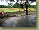 Excavating-for-the-retaining-wall-footer-for-Hole-6