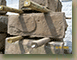 Close-up-of-a-window-paned-stonemasons-finish-on-an-antique-hand-cut-foundation-stone-14