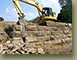 Close-up-of-the-removal-the-bridgestone-from-the-Maple-Street-bridge-SUGAR-GROVE-OH-6